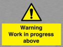gender-neutral-construction-warning-sign-warning-work-in-progress-above-with-exc~
